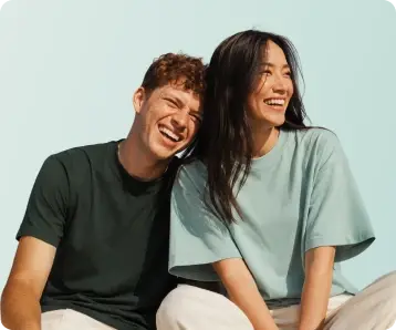 Two people laughing together
